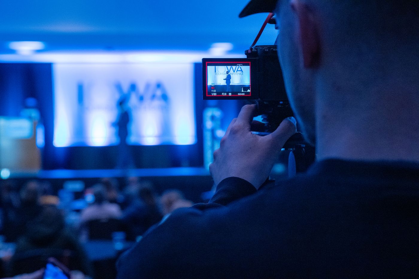 A conference livestream captured with a video camera